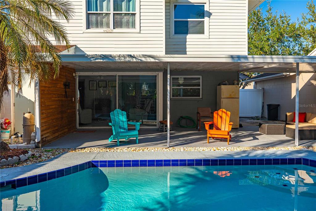5124 Springwood Drive Tampa, FL 33624 - Photo 15 of 53 a view of a house with a patio