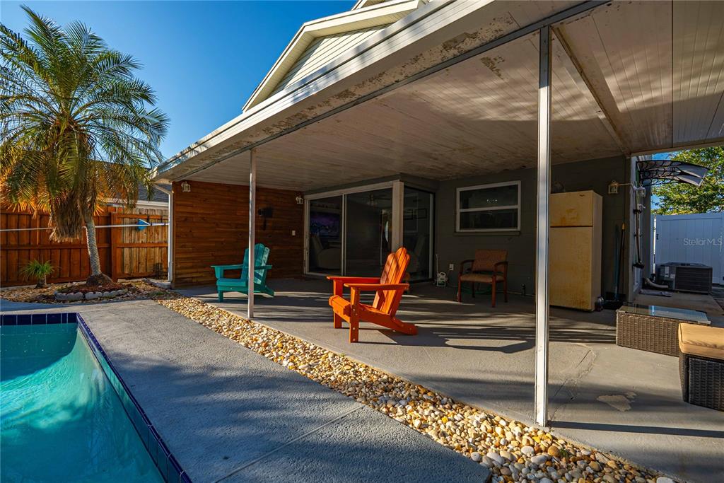 5124 Springwood Drive Tampa, FL 33624 - Photo 16 of 53 a view of a house with backyard and sitting area