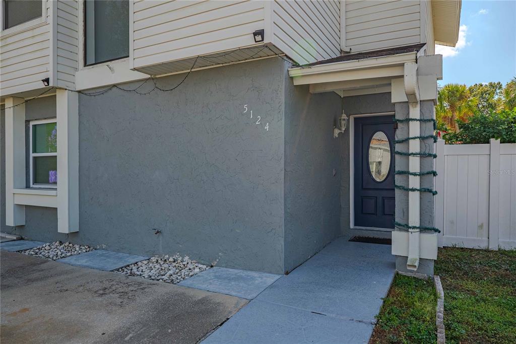 5124 Springwood Drive Tampa, FL 33624 - Photo 2 of 53 a view of a door of the house