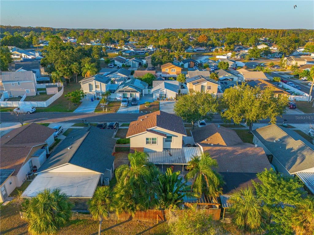 5124 Springwood Drive Tampa, FL 33624 - Photo 49 of 53 an aerial view of residential houses with outdoor space