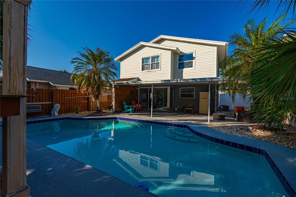 5124 Springwood Drive Tampa, FL 33624 - Photo 7 of 53 a front view of house with yard and outdoor seating