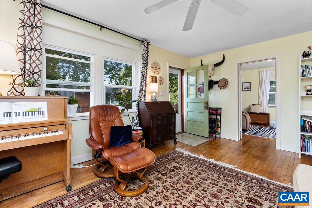 1002 2nd Street Southeast Charlottesville, VA 22902 - Photo 5 of 29 a living room with furniture and a window
