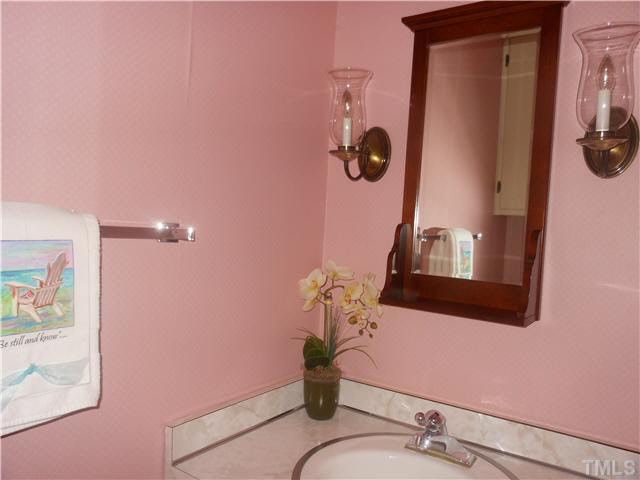 3605 Ranlo Drive Raleigh, NC 27612 - Photo 16 of 19 Powder room off the laundry room. Sorry, mirror does not convey! Half Bath