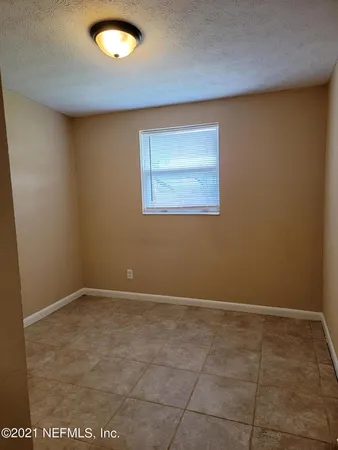 an empty room with a workbench