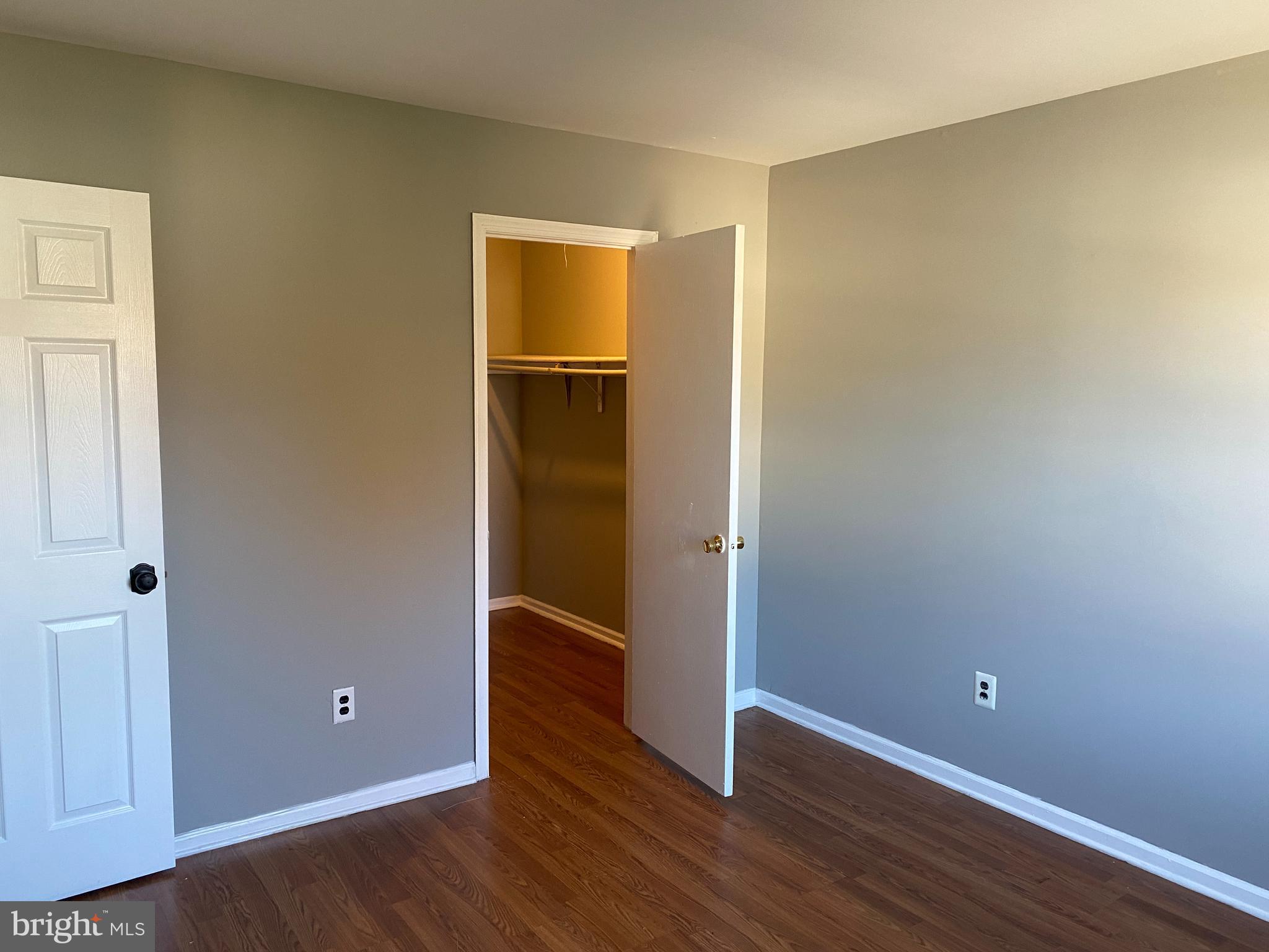 14 Berkshire Road Sicklerville, NJ 08081 - Photo 14 of 17 an empty room with wooden floor and closet