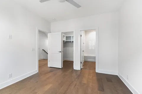 an empty room with wooden floor