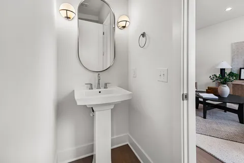 a bathroom with a sink and mirror