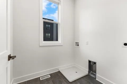 an empty room with a door