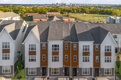a view of a city with an ocean view