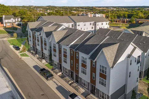 a view of a city with tall buildings