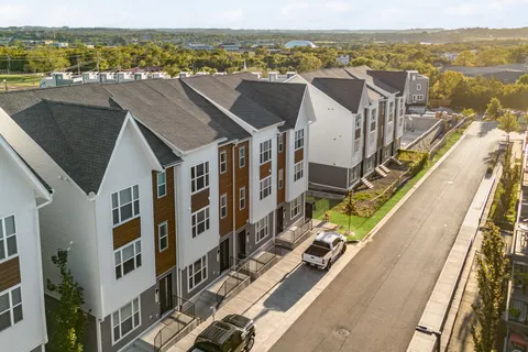 a view of a city with an ocean view