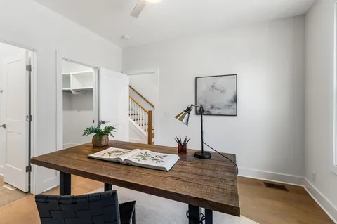 a view of a workspace with a table and workspace