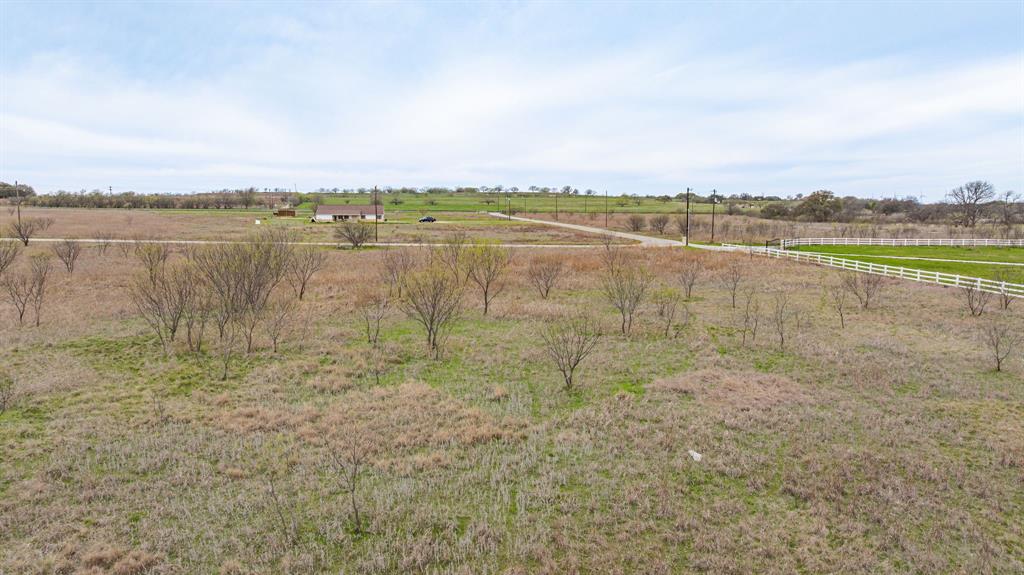 Lot 93 Mercers Preserve Road Comanche, TX 76442 - Photo 11 of 13 a view of a lake with houses in the back