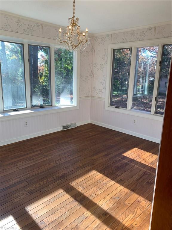 861 Chester Road Winston-Salem, NC 27104 - Photo 6 of 17 Kitchen breakfast nook leads to the sunroom. Current owner used it as the Dining Room