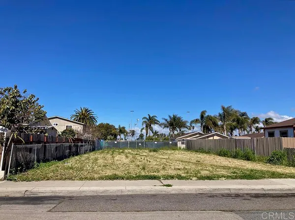 a view of a yard and mountain view