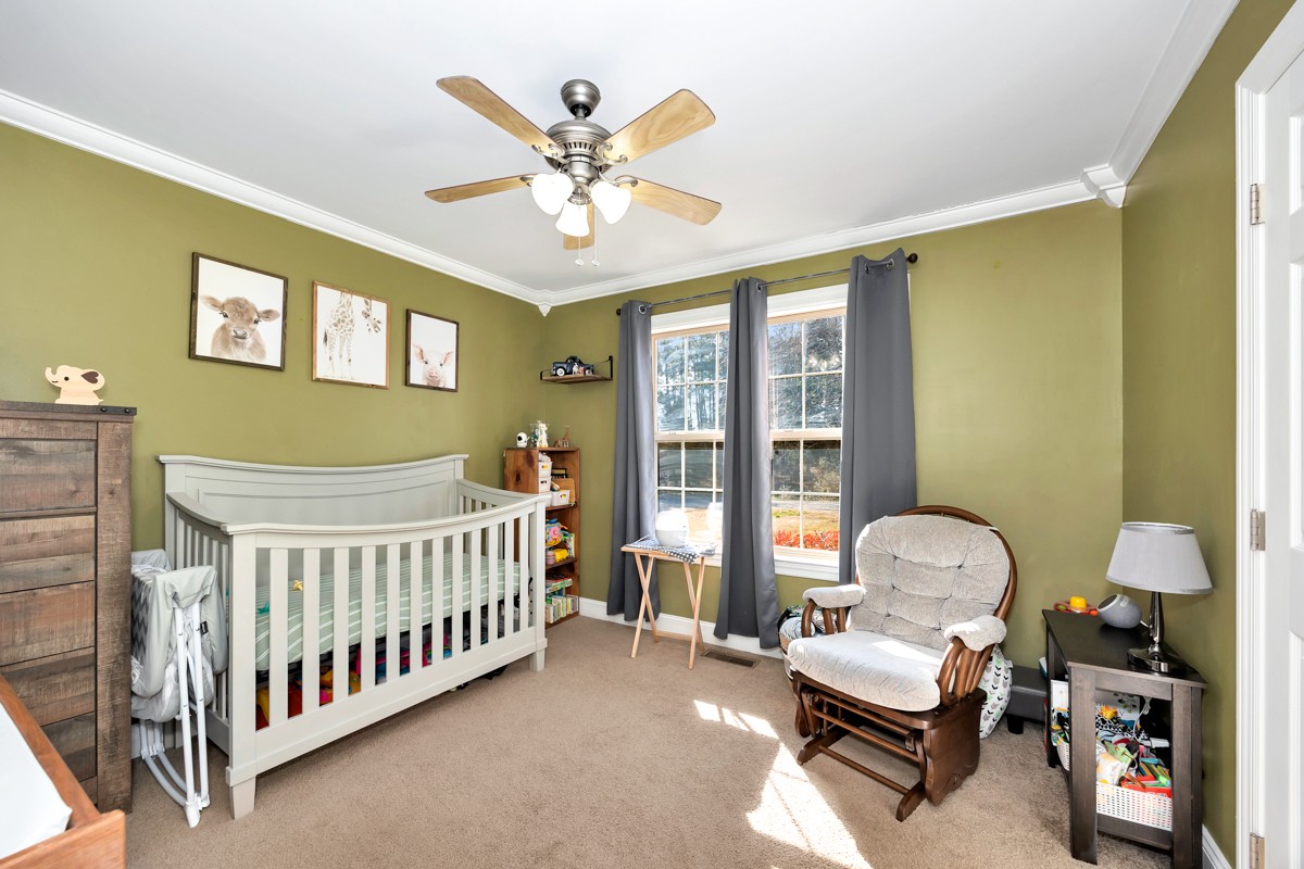 27474 North Wales Road Elkmont, AL 35620 - Photo 16 of 30 a bedroom with furniture and a window