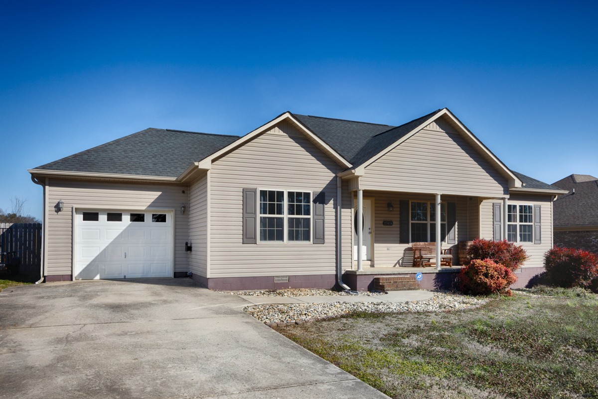 27474 North Wales Road Elkmont, AL 35620 - Photo 26 of 30 a front view of a house with a yard and garage