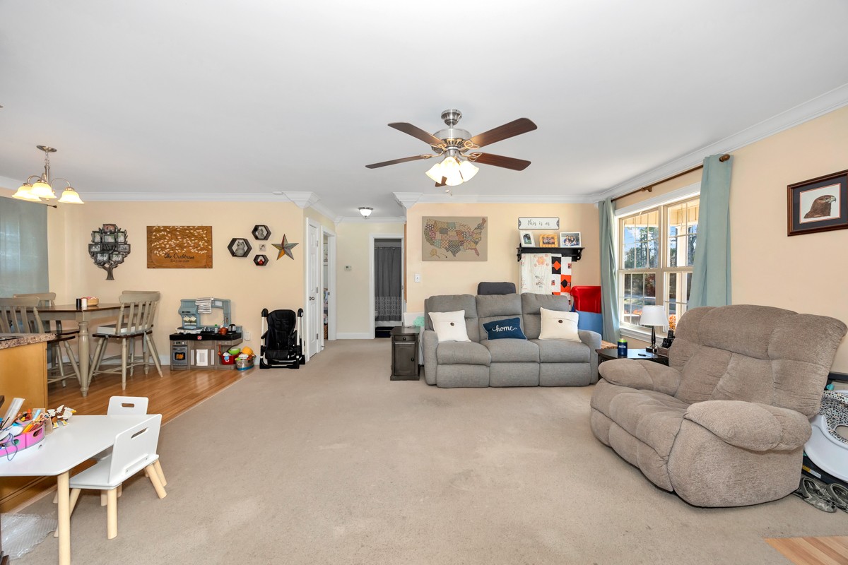 27474 North Wales Road Elkmont, AL 35620 - Photo 5 of 30 a living room with furniture and a large window