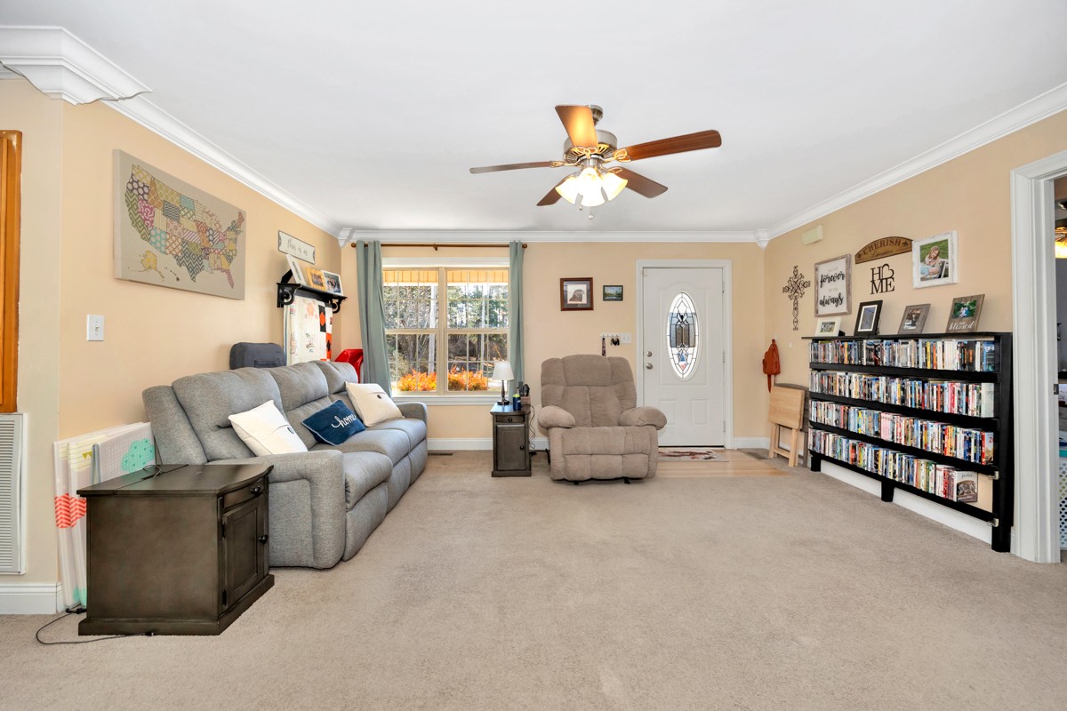 27474 North Wales Road Elkmont, AL 35620 - Photo 6 of 30 a living room with furniture and a large window