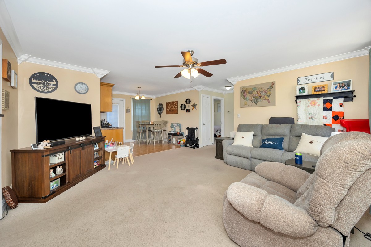 27474 North Wales Road Elkmont, AL 35620 - Photo 7 of 30 a living room with furniture and a flat screen tv
