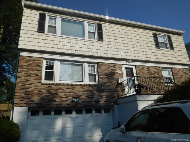 a view of a house with a balcony