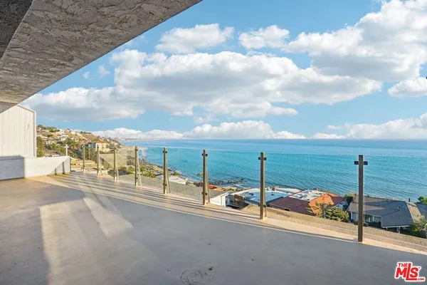 a view of a terrace with city view