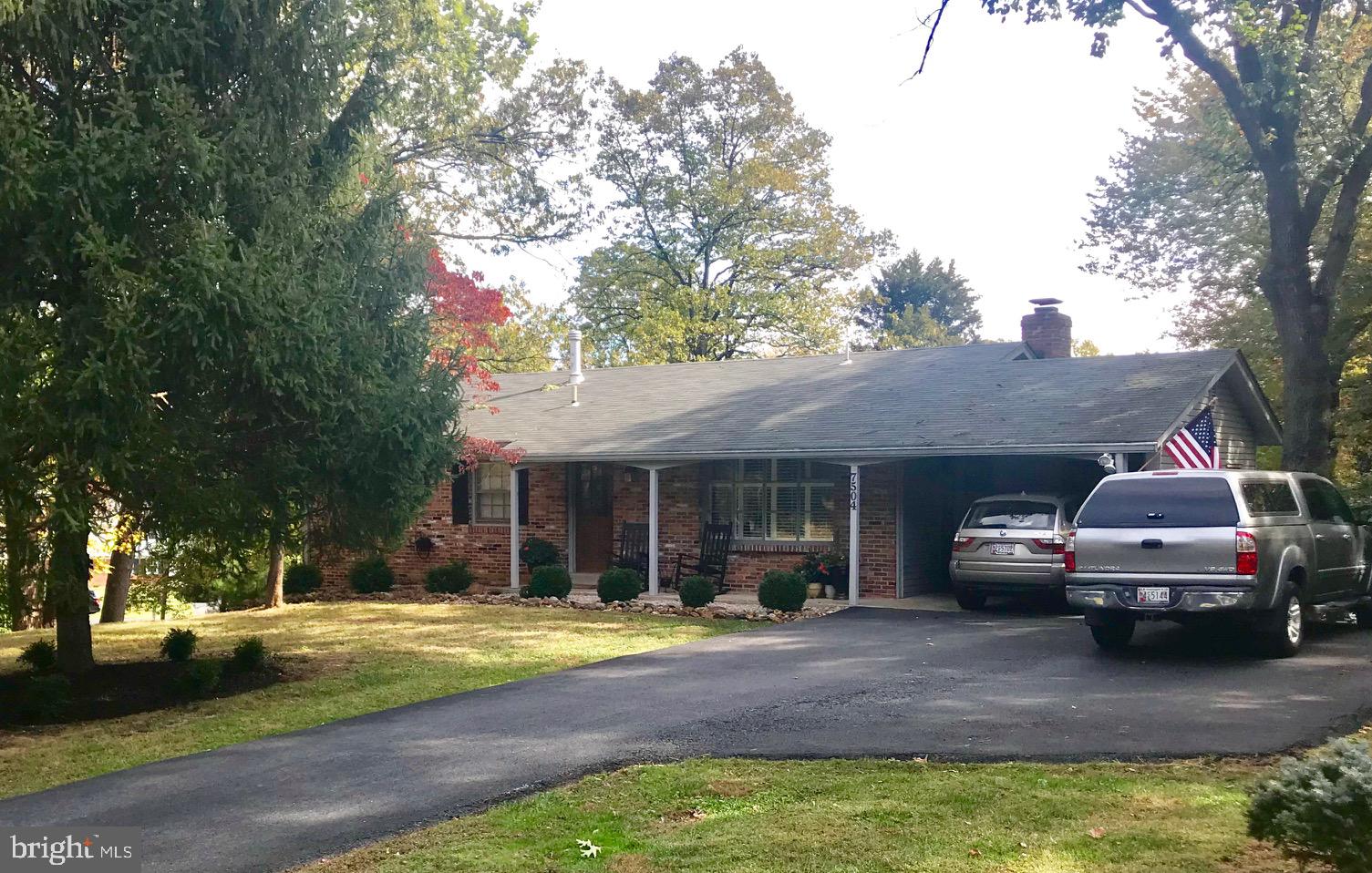 7504 Miller Fall Road Rockville, MD 20855 - Photo 1 of 30 Attached Carport plus parking pad & long driveway
