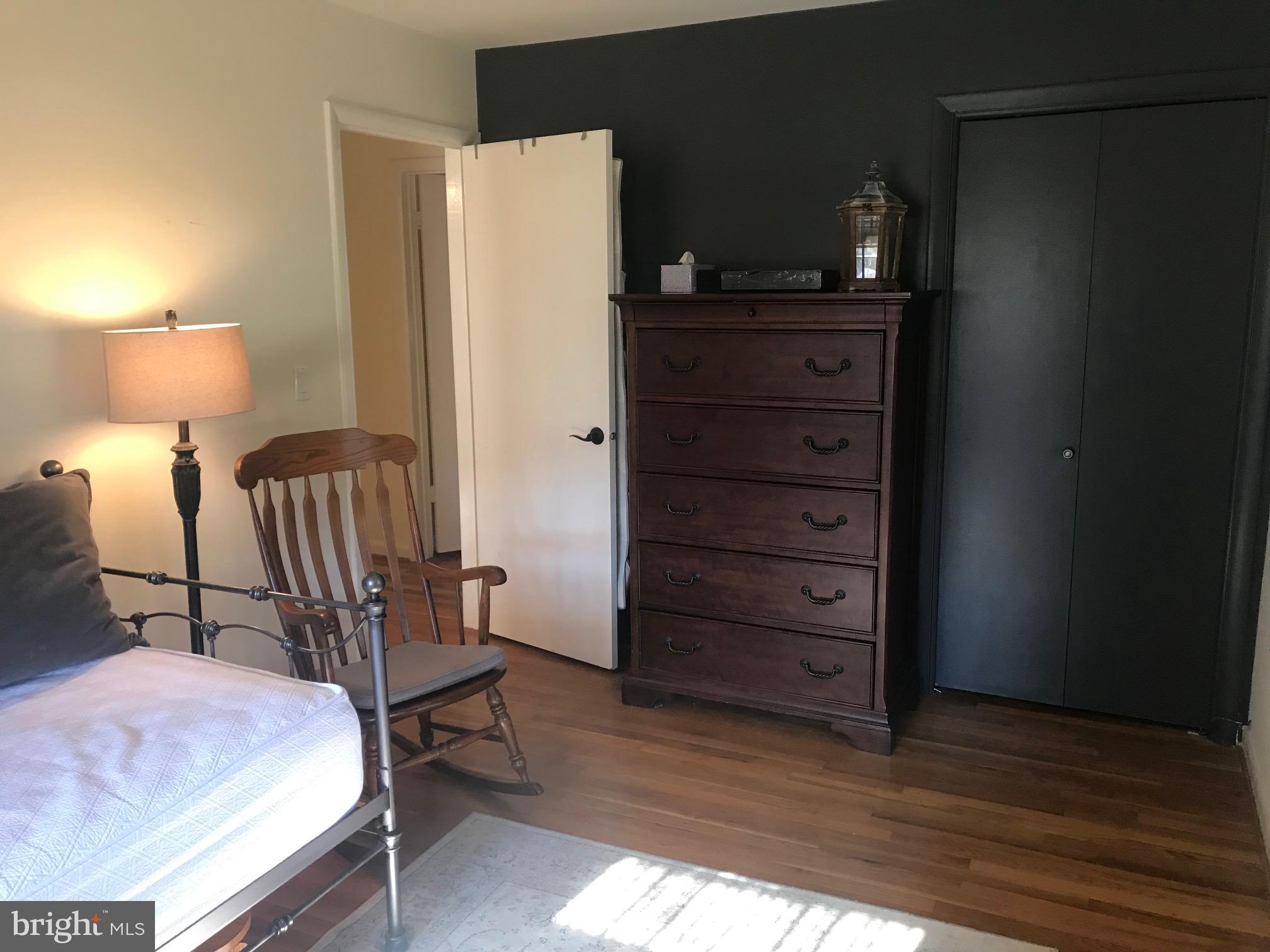 7504 Miller Fall Road Rockville, MD 20855 - Photo 25 of 30 Third Bedroom with hardwood floors