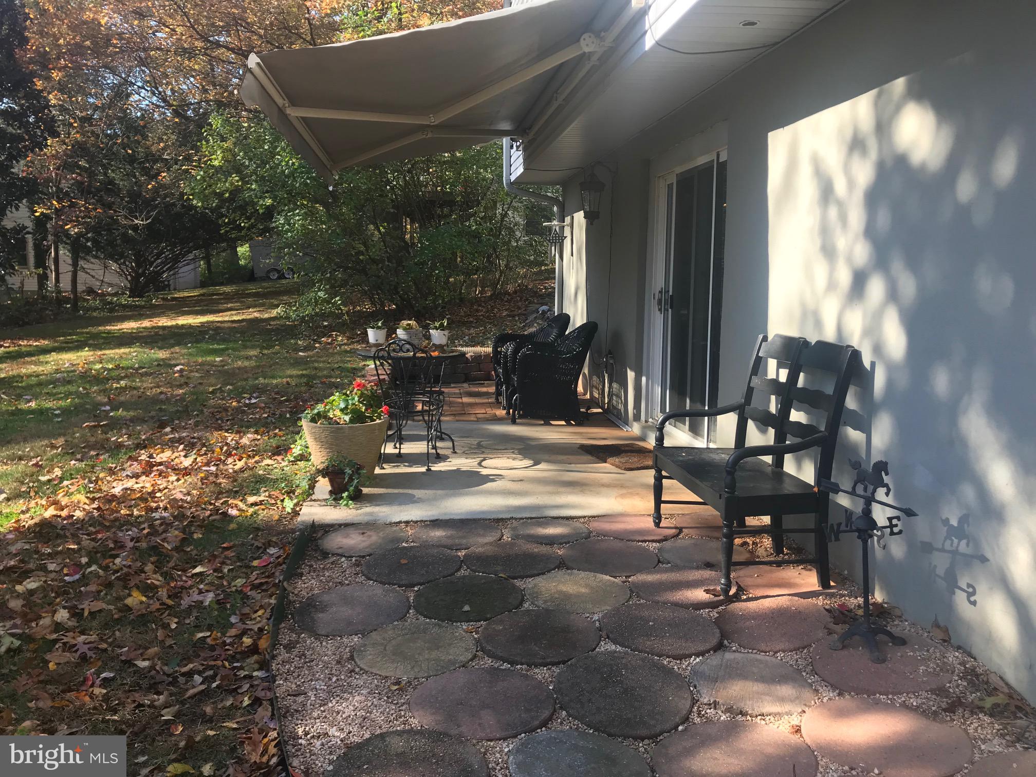 7504 Miller Fall Road Rockville, MD 20855 - Photo 5 of 30 Enjoy the retractable awning year round!