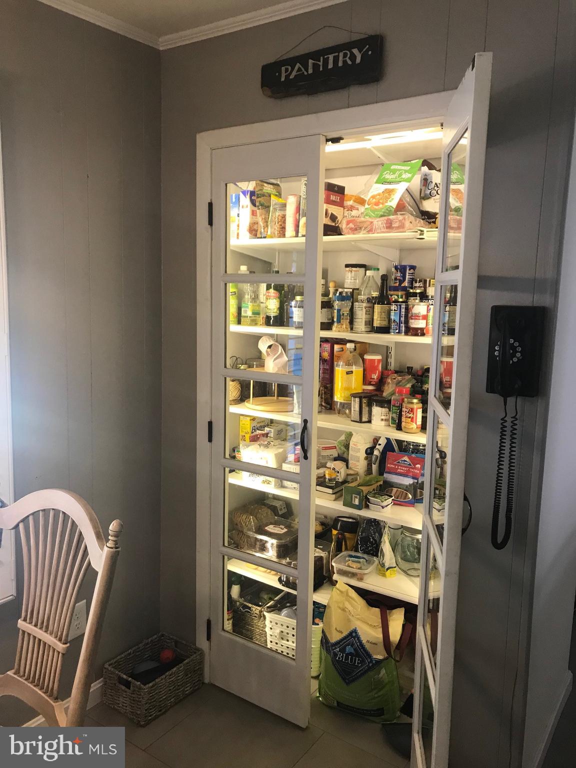 7504 Miller Fall Road Rockville, MD 20855 - Photo 10 of 30 Custom pantry- light turns on when the door opens