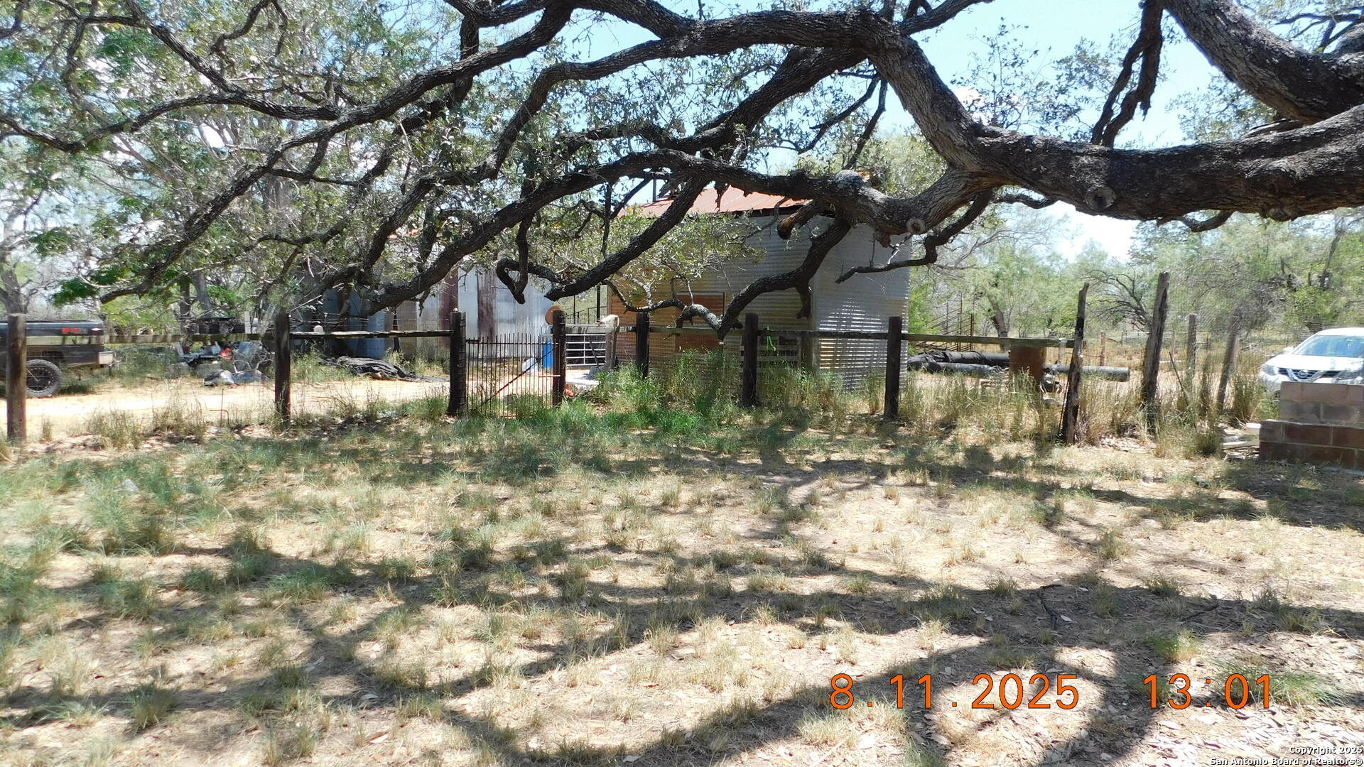 11620 Highway 16 Poteet, TX 78065 - Photo 24 of 38 a backyard of a house with lots of green space