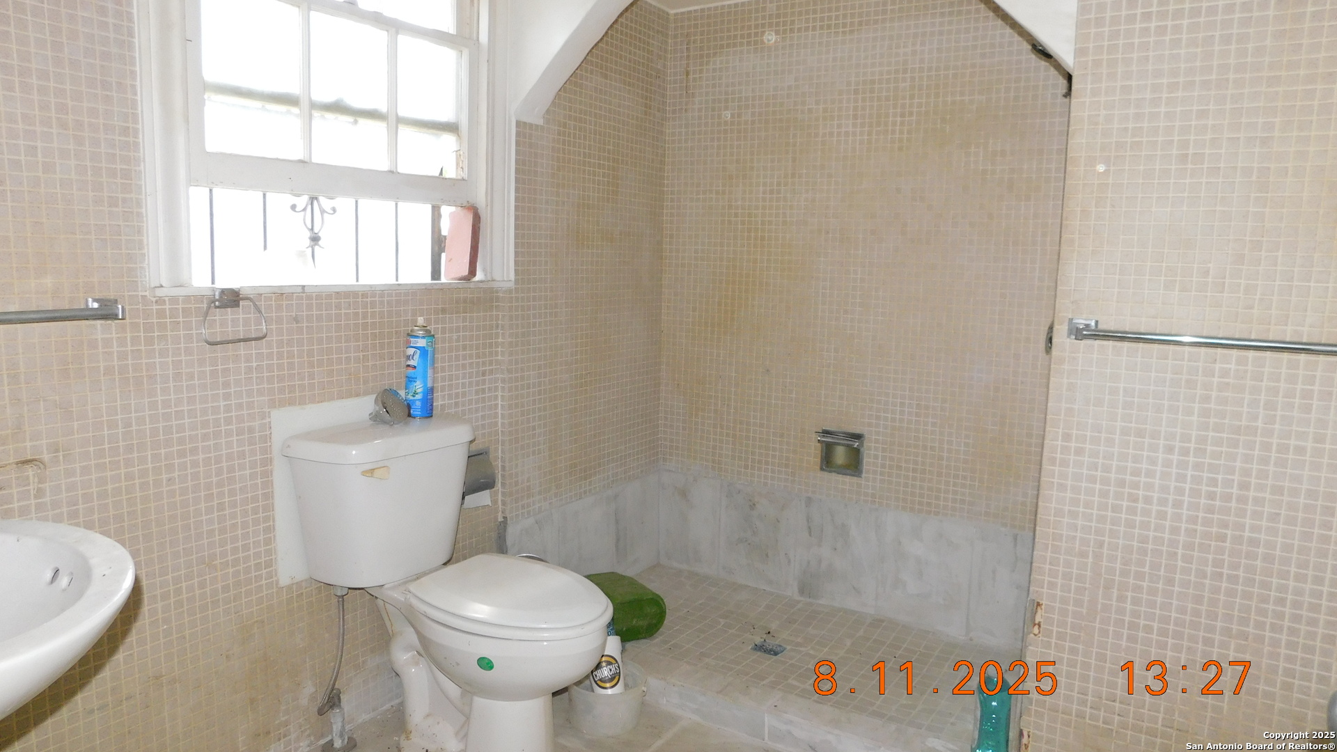 11620 Highway 16 Poteet, TX 78065 - Photo 32 of 38 a white toilet sitting next to a bath tub