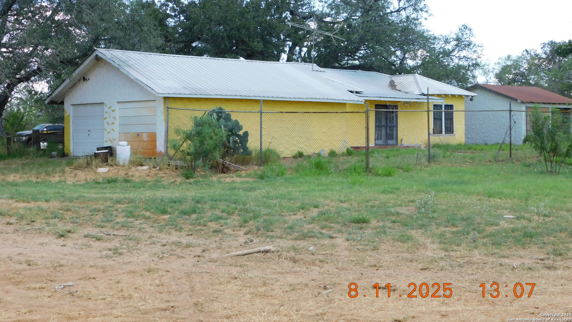 11620 Highway 16 Poteet, TX 78065 - Photo 8 of 38 a view of house with backyard