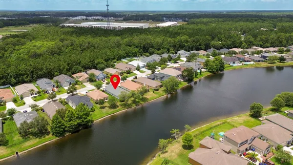 a view of a lake with a house