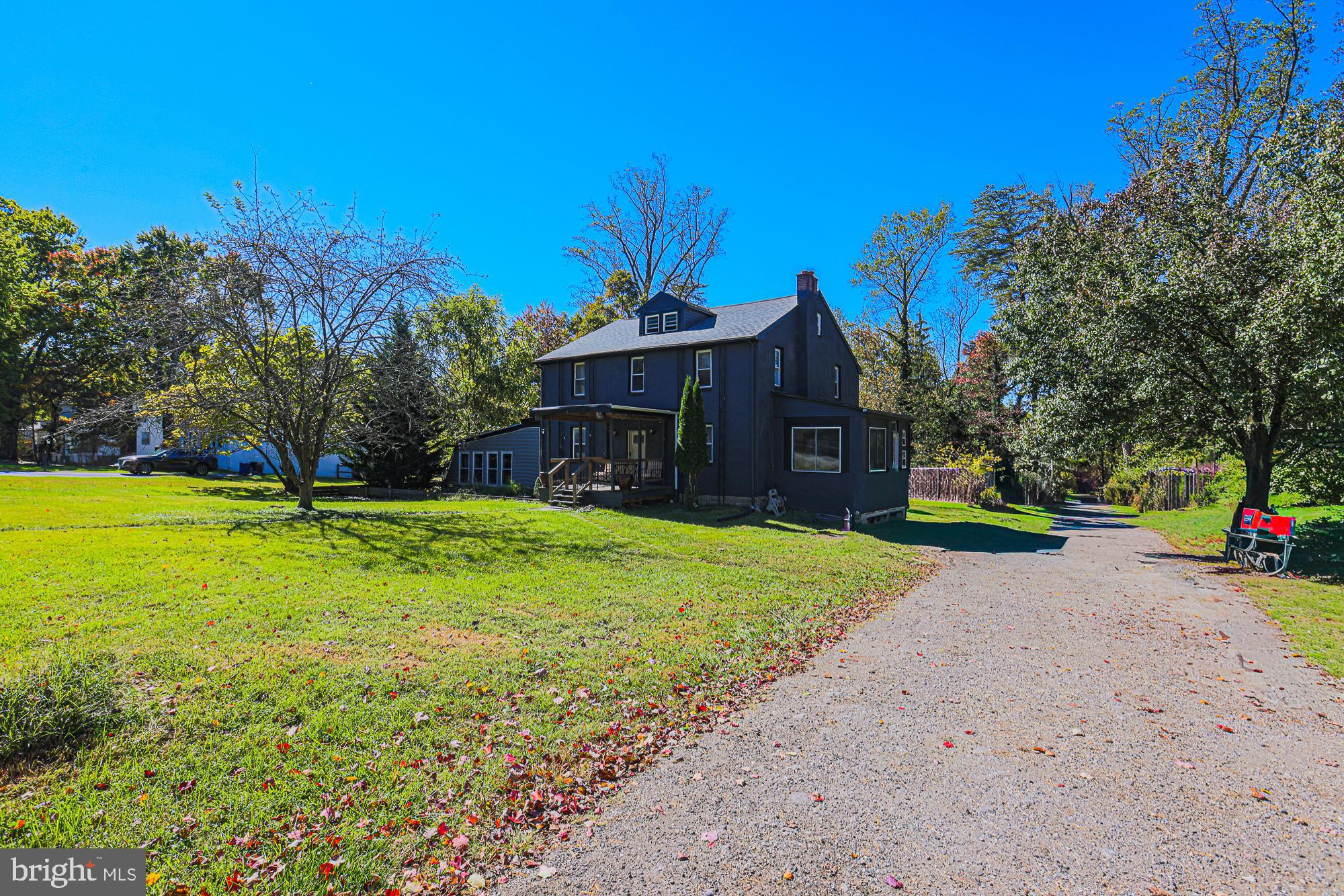 7215 Rockridge Road Baltimore, MD 21207 - Photo 3 of 62 a view of a house with backyard and a tree