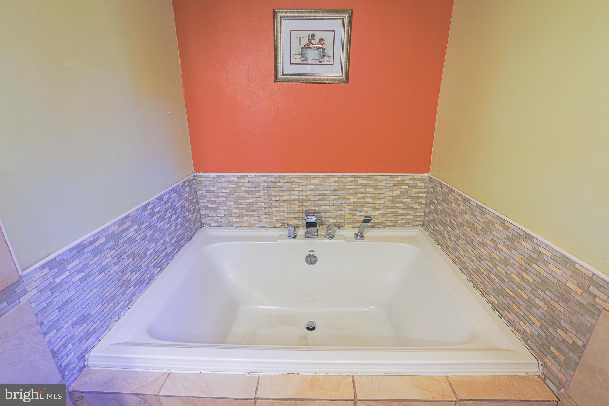 7215 Rockridge Road Baltimore, MD 21207 - Photo 39 of 62 a bathroom with a bathtub