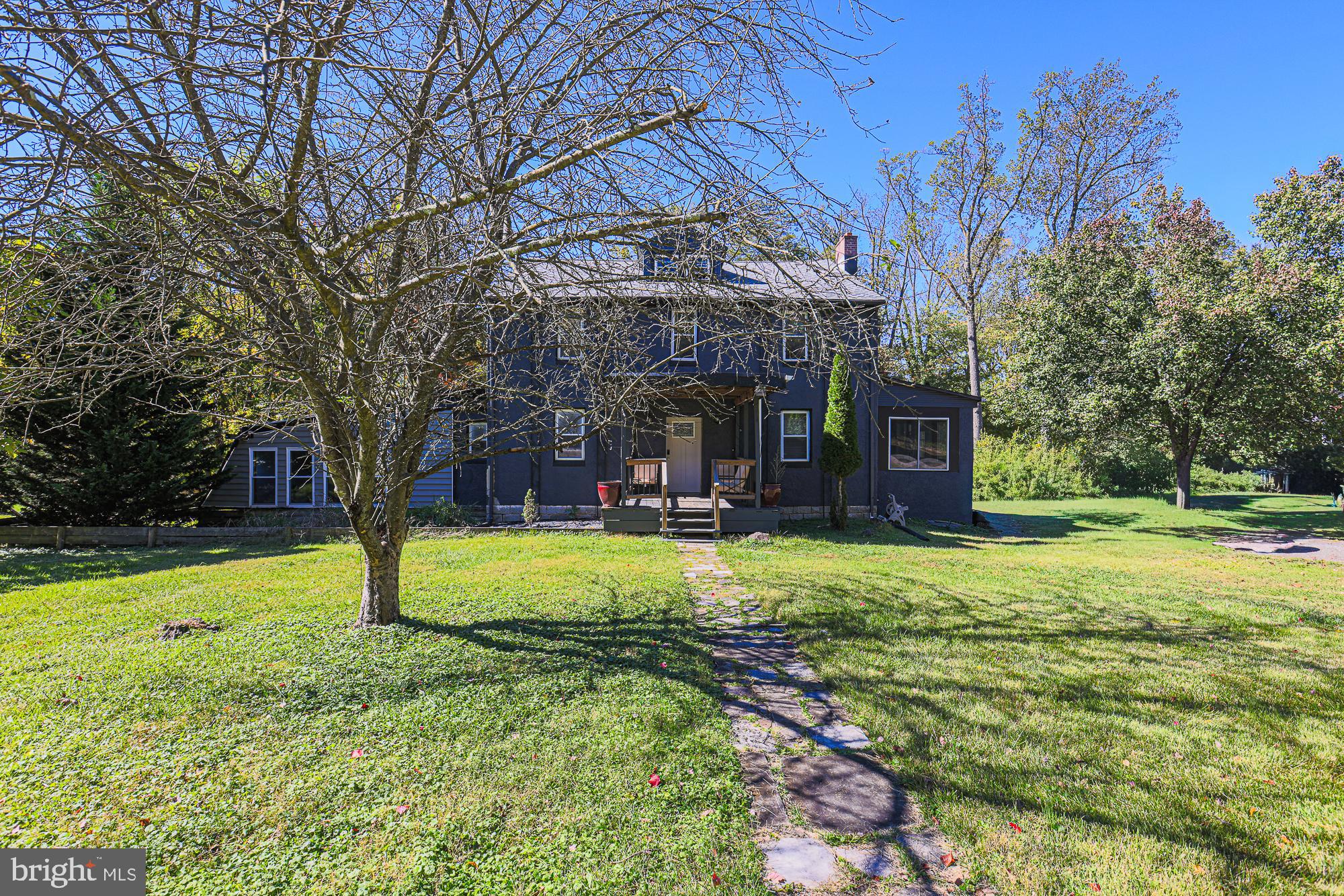 7215 Rockridge Road Baltimore, MD 21207 - Photo 4 of 62 a view of a house with backyard and tree
