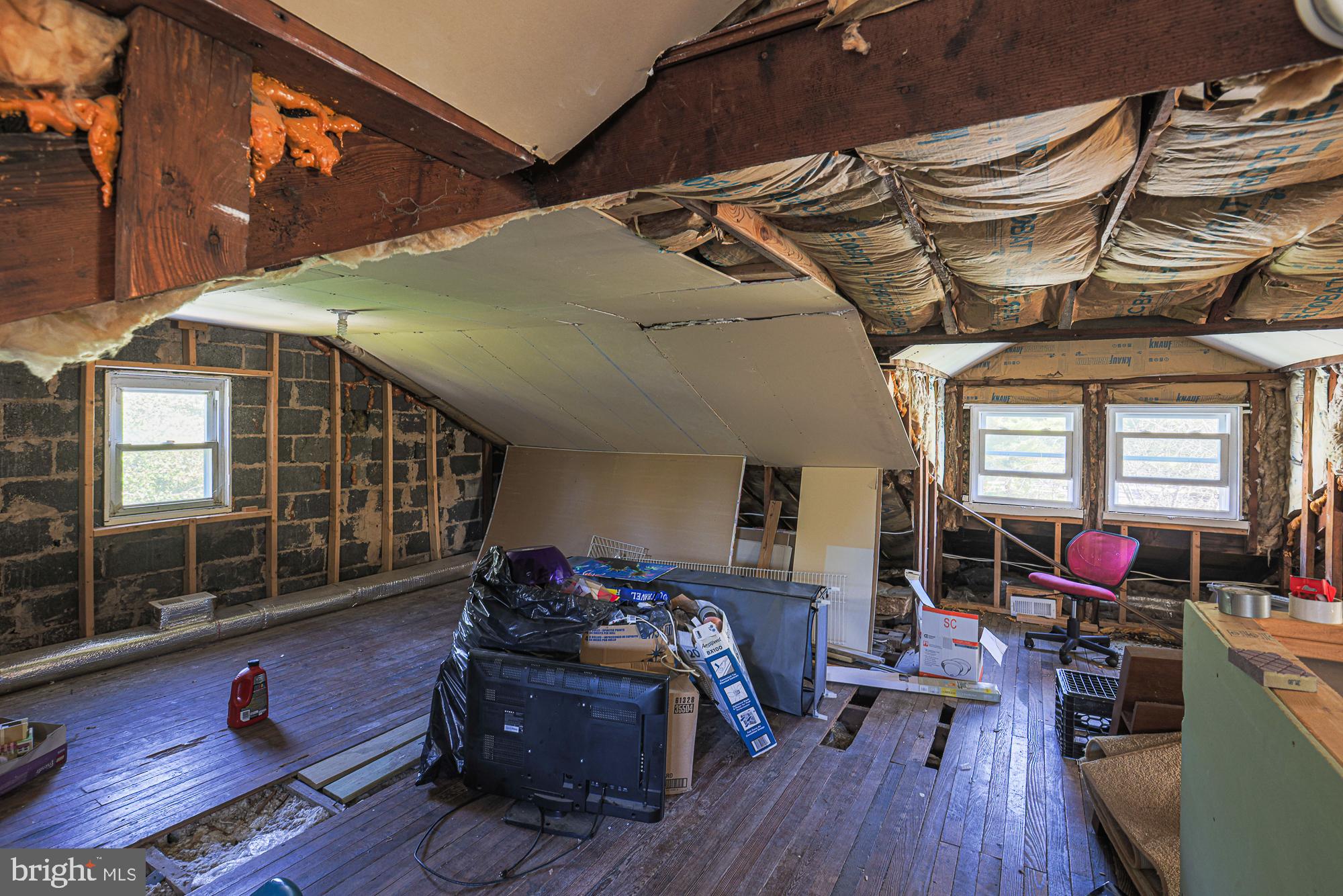 7215 Rockridge Road Baltimore, MD 21207 - Photo 50 of 62 a view of a patio with table and chairs with wooden floor and fence