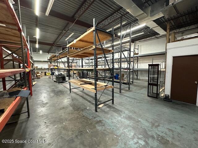 205 South Wickham Road Melbourne, FL 32904 - Photo 3 of 10 a view of a room with gym equipment