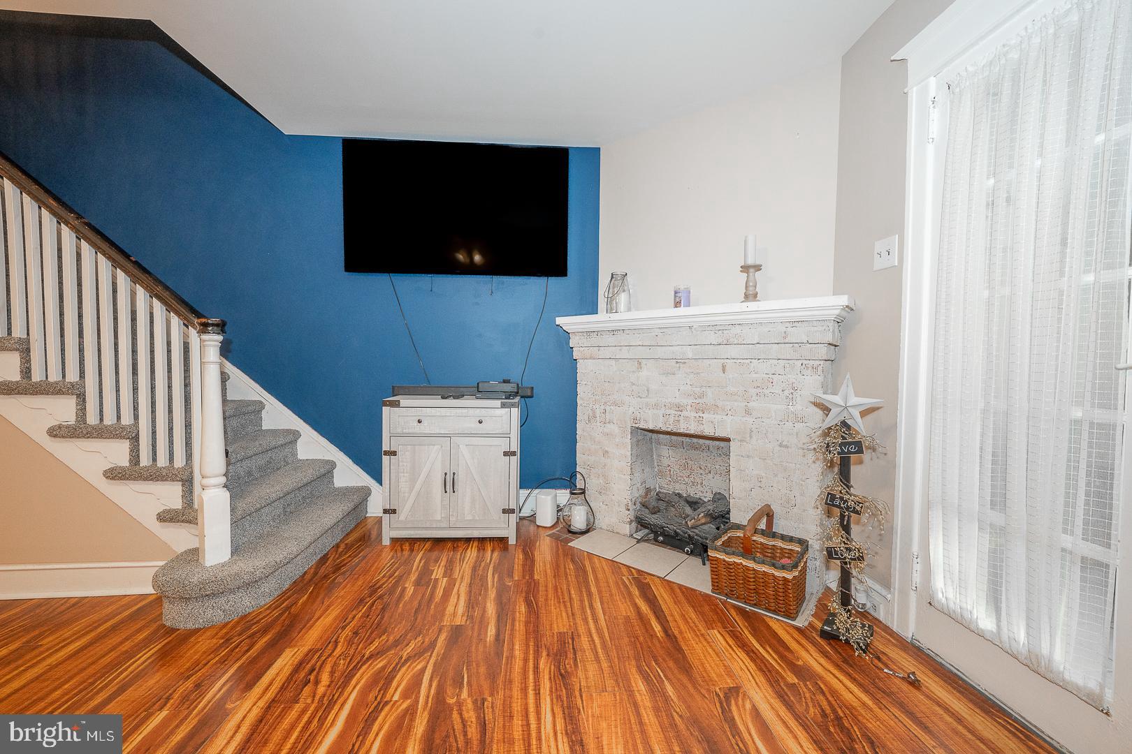 119 Wilson Avenue Havertown, PA 19083 - Photo 11 of 31 a view of a livingroom with furniture and a fireplace