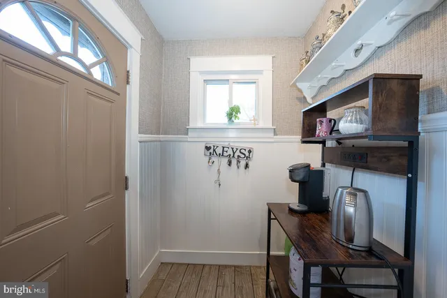 a bathroom with a sink a toilet and bathtub