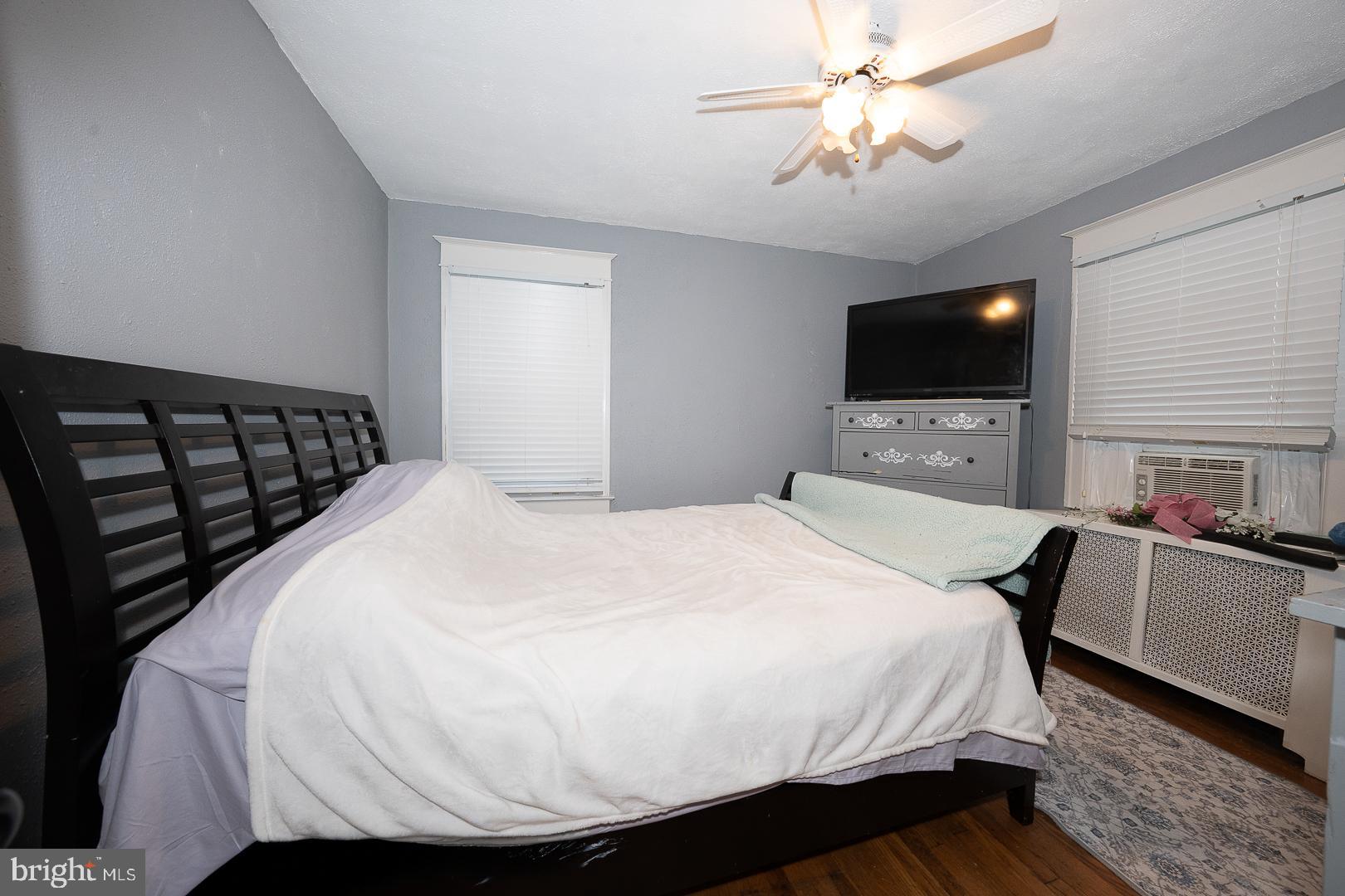 119 Wilson Avenue Havertown, PA 19083 - Photo 20 of 31 a bedroom with a bed and a flat screen tv