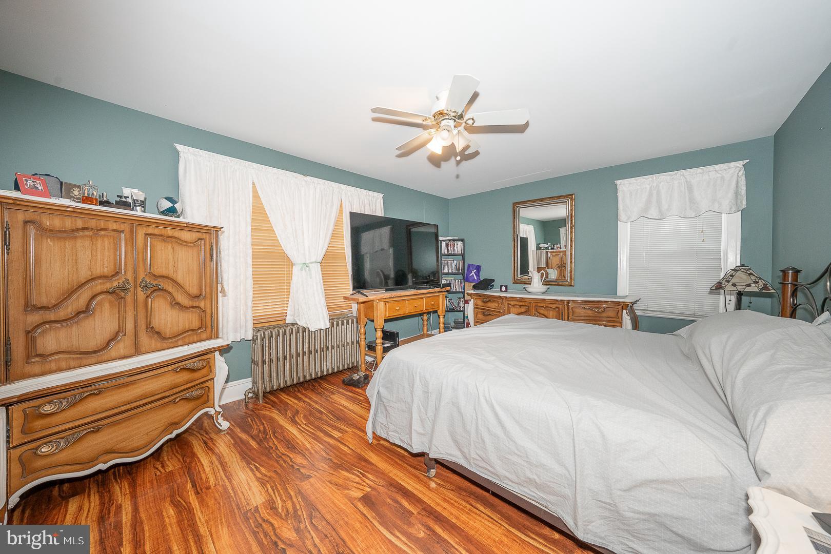 119 Wilson Avenue Havertown, PA 19083 - Photo 23 of 31 a bed room with a bed and a chandelier