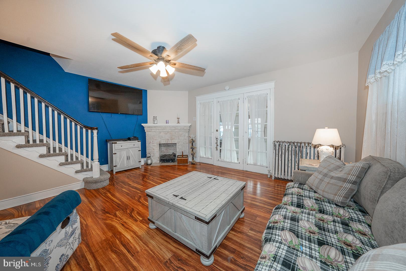119 Wilson Avenue Havertown, PA 19083 - Photo 9 of 31 a living room with furniture and a chandelier