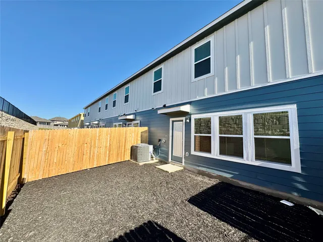 a view of a house with a large window
