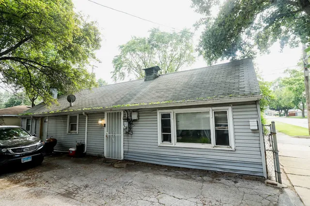 a view of a house with a patio
