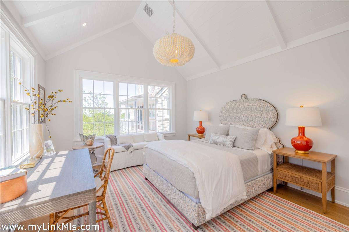 256 Polpis Road Nantucket, MA 02554 - Photo 15 of 30 a bedroom with a bed and window