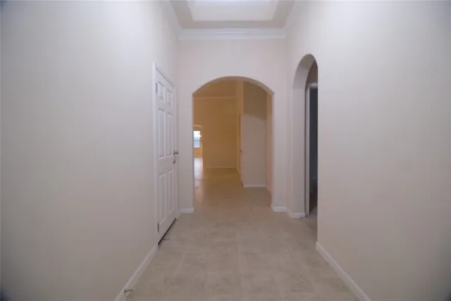 a view of empty room with windows