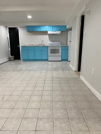 a bathroom with a shower and a toilet