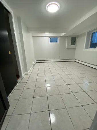 a view of backyard with outdoor seating and green space